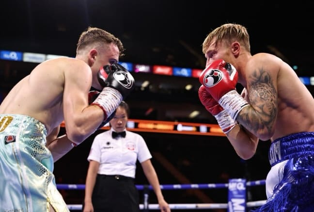 Frankie Wood and Callum Lee exchanging punches at The O2