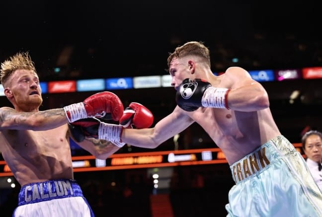 Frankie Wood throwing a right hand at Callum Lee at The O2