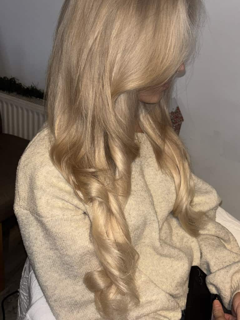 Long honey-blonde hair in soft loose waves
