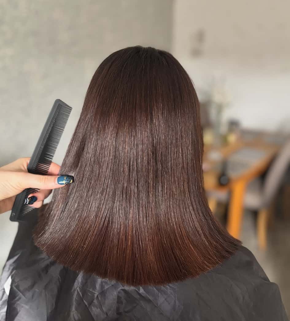Glossy precision blunt-cut bob in chocolate brown