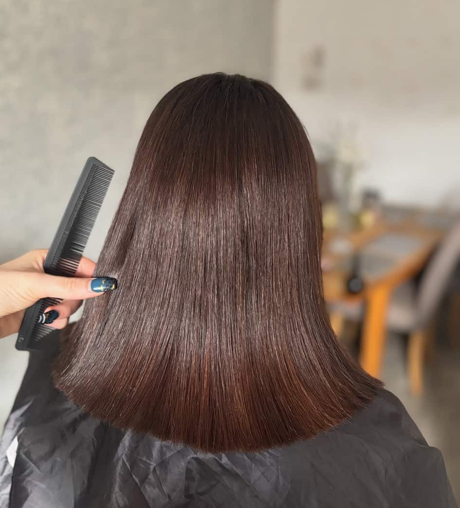 Glossy precision blunt-cut bob in chocolate brown