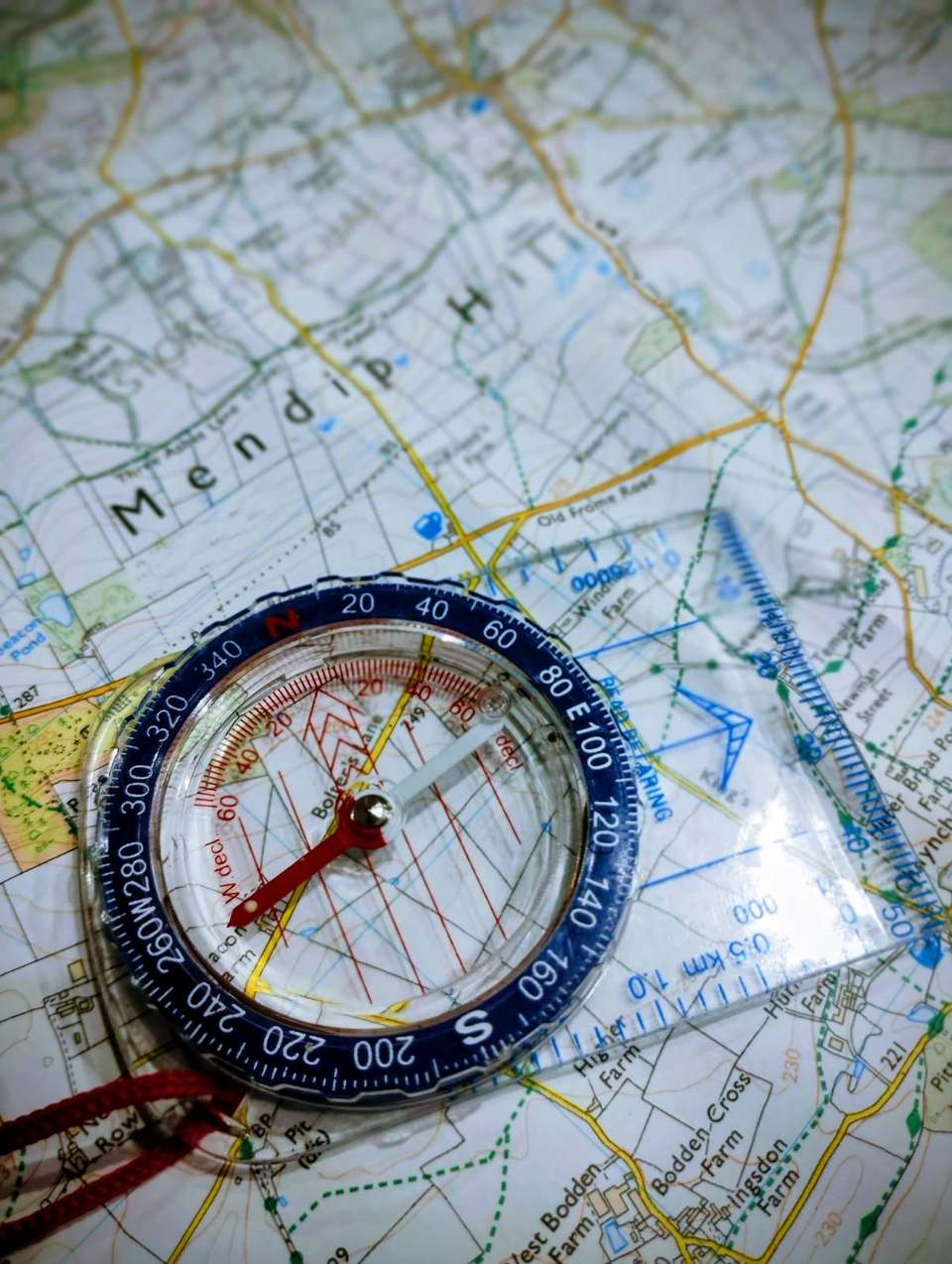 Compass laid on an Ordnance Survey map of the Mendip Hills