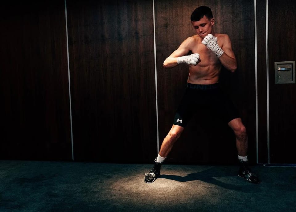 Frankie Wood shadow boxing backstage during warm-up