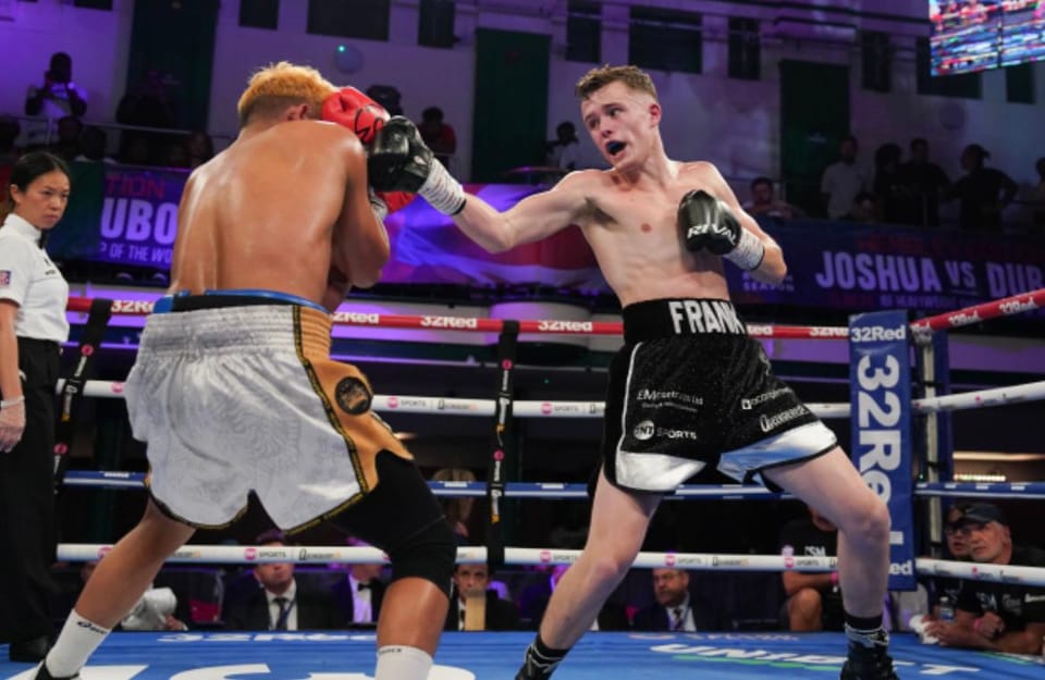 Frankie Wood throwing a right hand during a professional fight