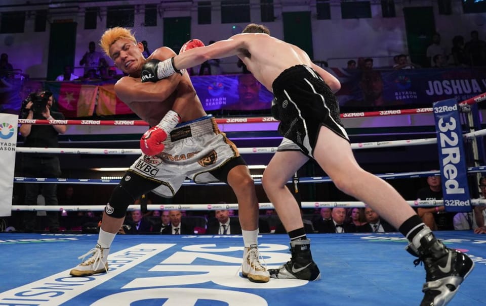 Wide shot of Frankie Wood in action during a fight