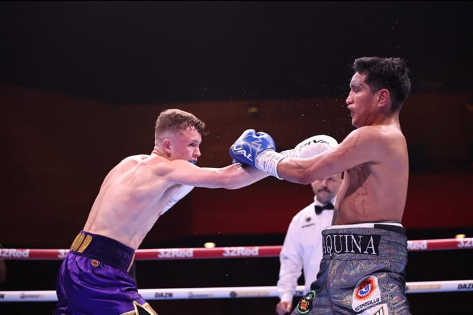 Frankie Wood landing a jab in the ring