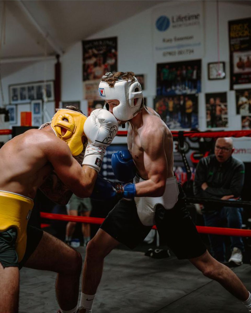 Frankie Wood sparring with headguards at the gym