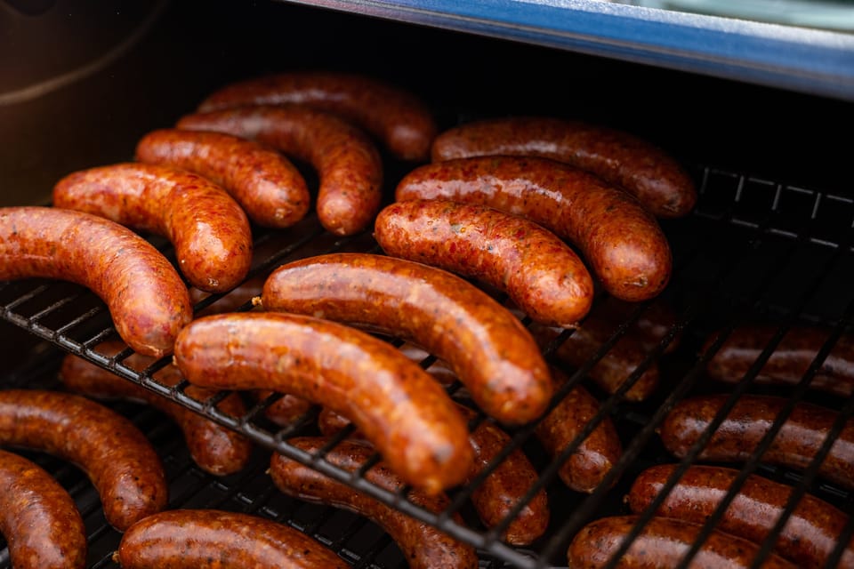 Wilson's BBQ smoker trailer at an event