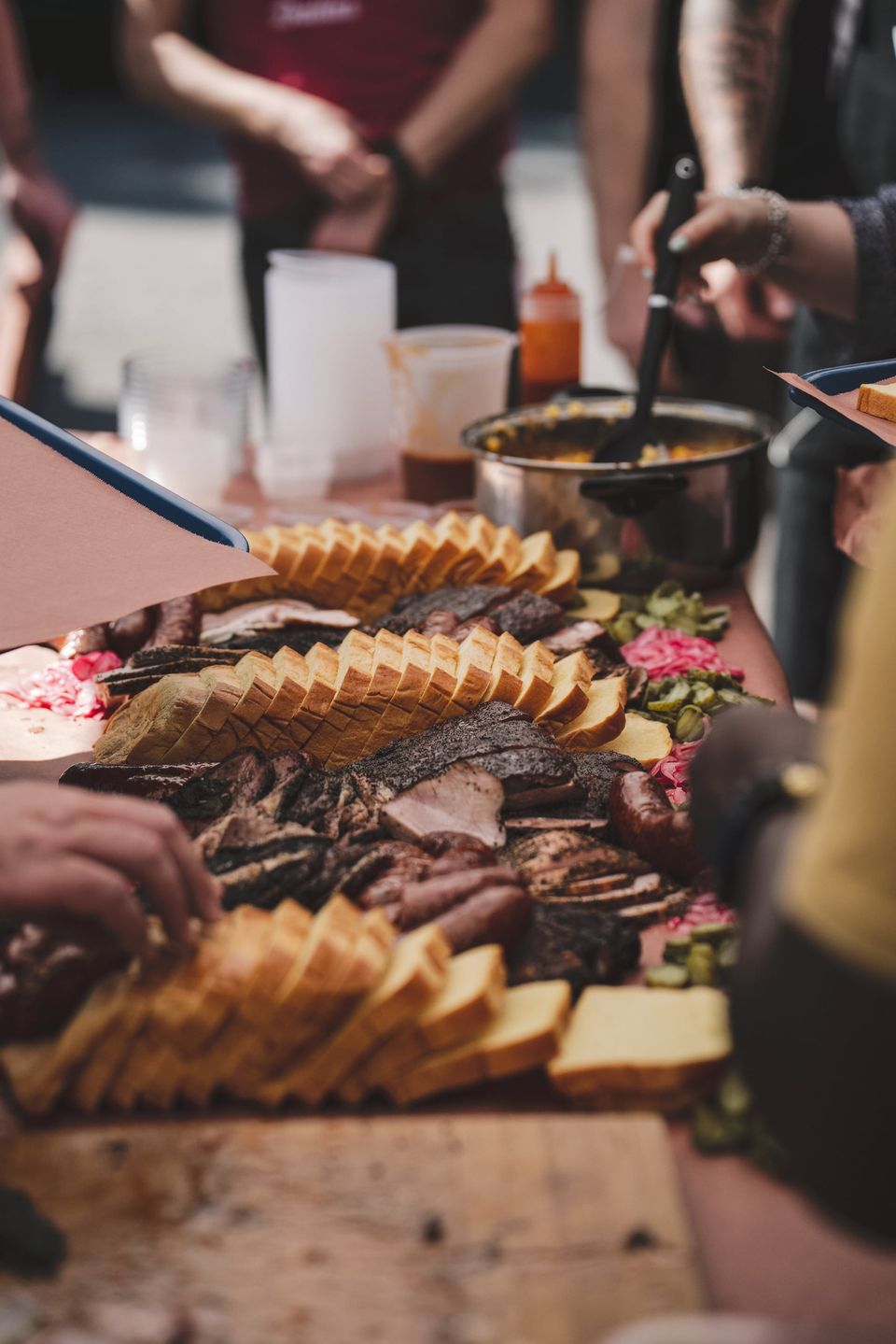 Class attendees serving themselves at the end of a Wilson's BBQ class