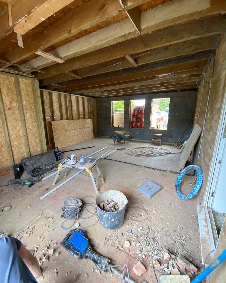 House extension interior during construction showing blockwork and timber frame